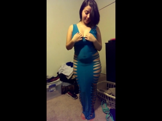 plumper in a blue dress shows boobs